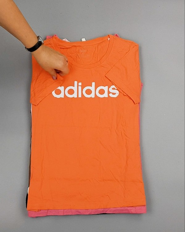 Фотография  752 - Cream Футболки поло женские#25 кг оптом в Москве и Московской области